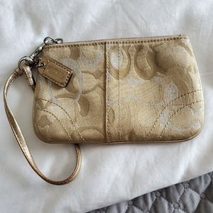 COACH gold wristlet
